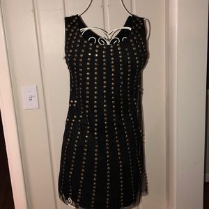 Black and gold disk dress
